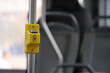 © Towfiqu Barbhuiya  - Yellow stop button on public transport in urban setting