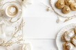 © Odrua Design - Xícara de café elegante com detalhes dourados, acompanhada de doces e decorações festivas em fundo branco, criada com IA generativa para um visual sofisticado e convidativo