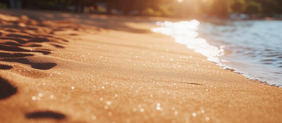 Wall Mural - Golden sunset beach, waves lapping shore, tranquil scene