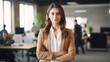© Aqsapics - young businesswoman standing at modern office