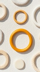 Leinwandbilder - Modern Geometric Jewelry Display Textured Ceramic and Metallic Rings on Natural Surface - Luxury Retail Visuals and Fine Jewelry Marketing Enhancement