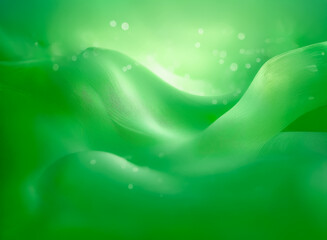 Wall Mural - abstract swirls of vibrant green with soft bokeh light. smooth, flowing shapes create a calming, org