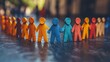 © Kristian - Figures crafted from colorful paper holding hands in a circle, embodying a sense of unity, strength in diversity, and cooperative spirit, enhanced by vibrant artistic styling.