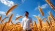 © Artem - Golden wheat field with man embracing nature's peace