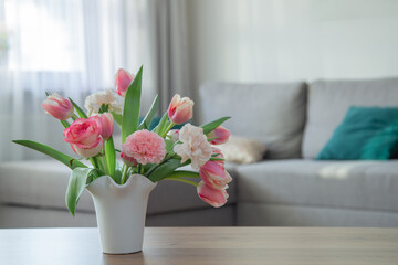 Wall Mural - pink spring flowers in white ceramic vase in modern home interior