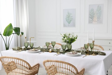 Wall Mural - Color accent table setting with glasses, flowers and olive napkins