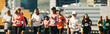 © Jacob Lund - Group of runners participating in a city marathon event
