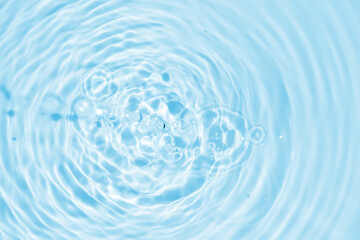 Wall Mural - abstract transparent water shadow surface texture natural ripple on blue background