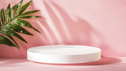 Wall Mural - White round podium on pink background with palm leaf and shadows.