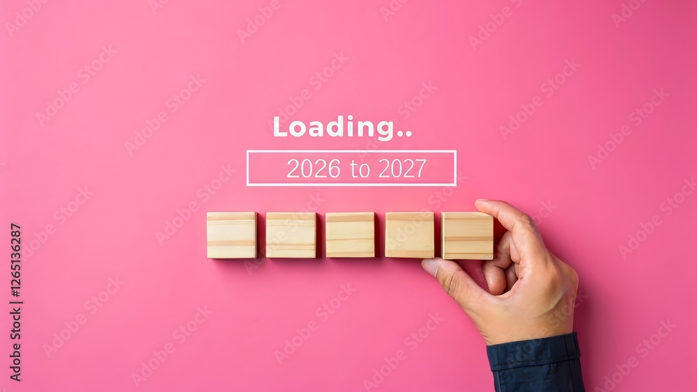 Loading Transition from 2026 to 2027 with Wooden Blocks on Pink ...