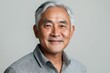 © Mark - Portrait smile handsome senior mature Asian man isolated background
