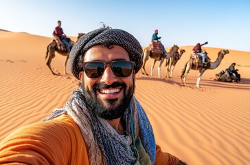 Wall Mural - A selfie of a happy Moroccan man in the desert with camels and people