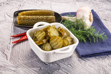 Wall Mural - Sliced marinated cucumbers in the bowl