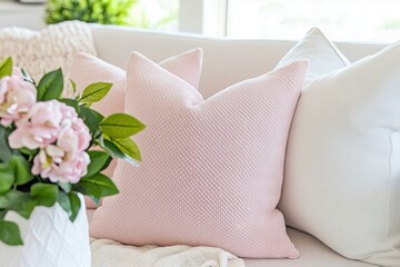 Wall Mural - Stylish living room featuring dusty rose pillows and a floral arrangement in a bright, airy setting