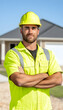 © bcendet - Construction worker portrait near new house, outside, for home inspection advert