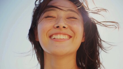 Wall Mural - Joyful young woman smiling brightly against a sunny backdrop, capturing a moment of happiness and freedom