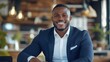© yanto - Smiling businessman cafe portrait