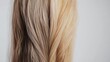 © Anat art - Comparison of healthy smooth hair and brittle damaged hair showcasing visible differences in texture and appearance. Generative AI
