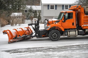 Poster - close up on snowplow driving on residential street