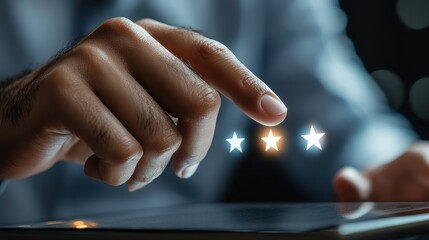 Leinwandbilder - A hand is pointing at three stars on a tablet