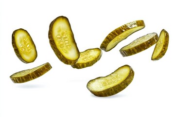 Wall Mural - Slices of pickled cucumber tumbling down against a white backdrop.