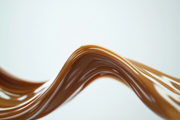 Brown wave of chocolate flows across a white background