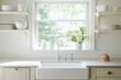 © Zahra - Bright kitchen with white cabinets and a farmhouse sink.