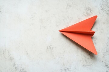Fototapete - Red paper plane symbolizes business strategy and success with innovation on a clean white background. Generative AI