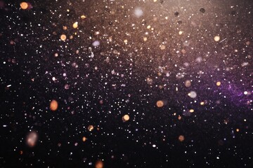 Wall Mural - Abstract background with golden and purple bokeh lights and particles.