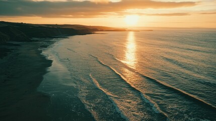 Wall Mural - Serene Sunset Over Calm Ocean Waves on a Tranquil Beach Shoreline