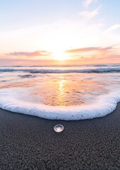 Canvas Print - Seashell by wave edge at beach. Ocean waves & sunset glow in background. Beauty product display