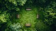 © mlangsen - Aerial view of park benches in a circular green space surrounded by trees