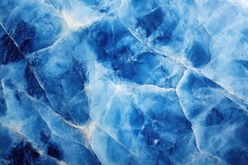 Wall Mural - A close-up shot of the surface of a blue marble, featuring its natural texture and patterns