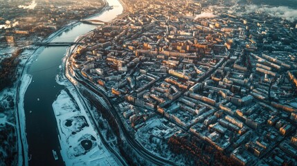 Wall Mural - Urban landscape with a river flowing through the city, suitable for use in travel or urban planning contexts