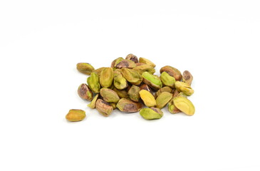 Wall Mural - Peeled pistachios pile isolated on white