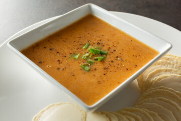 Wall Mural - A view of a bowl of lobster bisque.