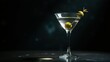 © Александр Бердюгин - An elegant clear martini with a green olive garnish, set on a black surface, evoking refined cocktail allure and upscale bar ambiance.