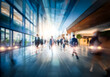 © YiuCheung - Hong Kong commercial center, bright modern interior with blurred motion of business people walking. Busy business environment.