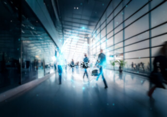 Aufkleber - Blurry image of people walking through an airport terminal with large windows.