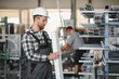 © Serhii - Male worker at a factory
