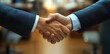 © Olya - Handshake Business Deal Success Multinational Collaboration Communication Partnership Teamwork Diversity