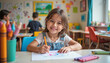 © Lyudmila Finkel - Happy girl drawing in classroom with colorful decorations, Children's Day, blurred background
