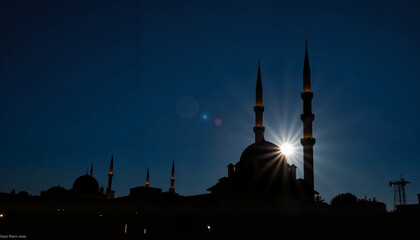 Serene mosque silhouette under starry night sky, architectural beauty