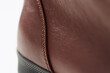 © GCapture - Closeup detail shot of brown leather sneaker