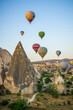 © Xavier Allard - Balloons flying near Goreme in Cappadocia, Turkey