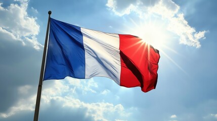 the flag of France, which is waving in the wind. The flag is rectangular in shape and has three horizontal stripes of blue, white, and red.  2