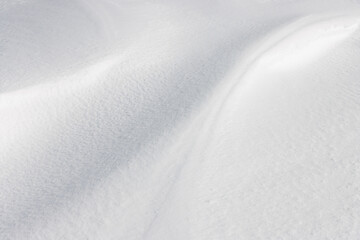 Wall Mural - soft smooth lines and 3d curves in silky white winter snow surface