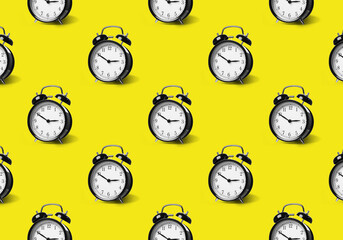 Wall Mural - Pattern of black alarm clocks on yellow background