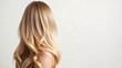 © Natalie - Luminous Long Blonde Hair Cascading on Light Gray Background