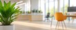 © Planetz - A modern office interior featuring a green plant, bright lighting, and stylish furniture, creating a fresh and inviting workspace.
